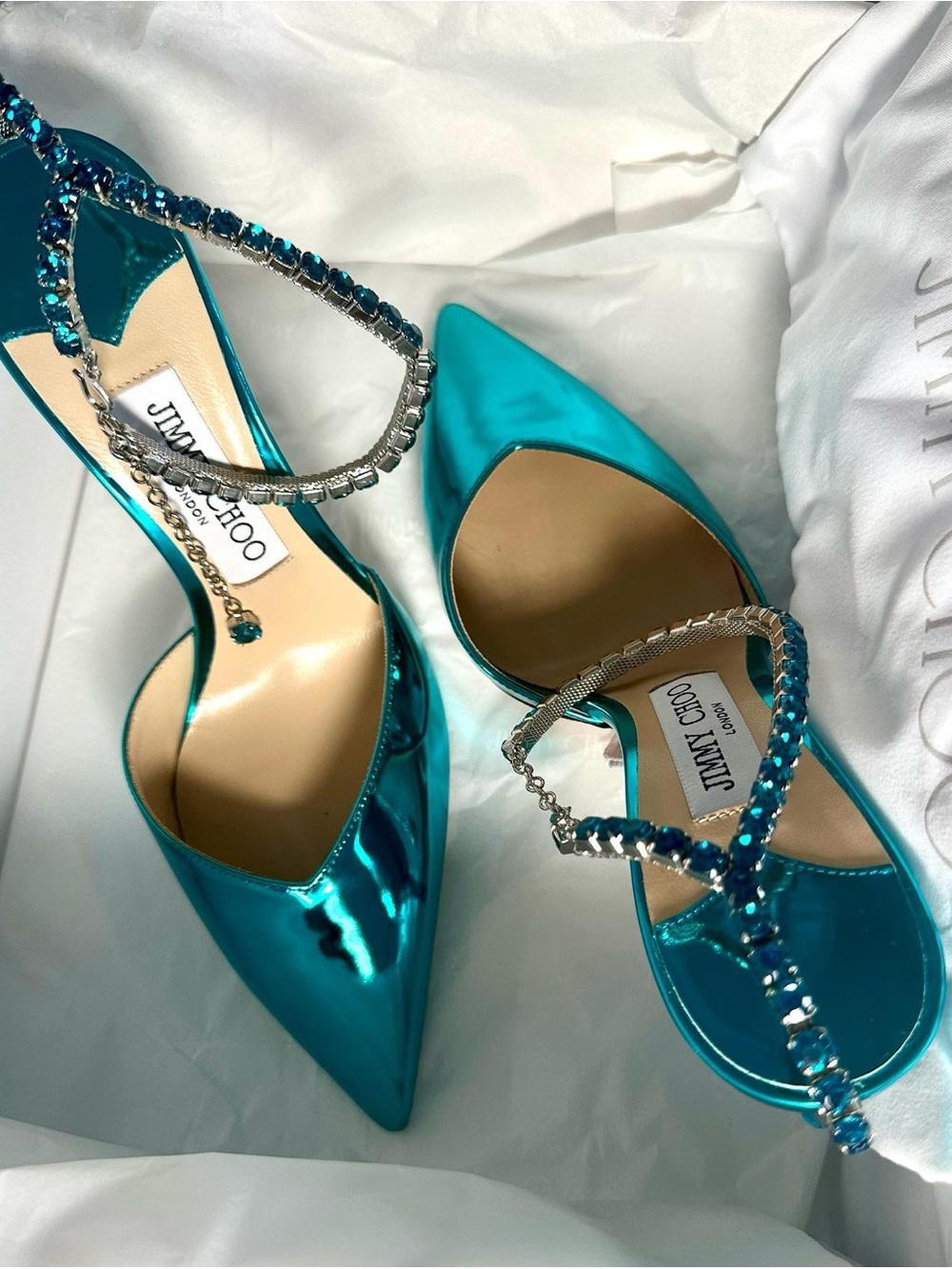 Jimmy Choo Saeda 100
Turquoise Pumps with Crystal Embellishment
